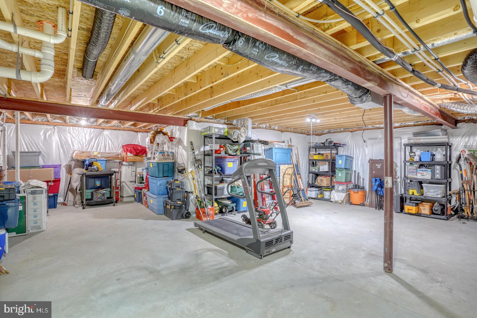24077 Caldwell Circle Lewes, DE 19958 - Photo 52 of 60 a view of a storage room with a lot of stuff