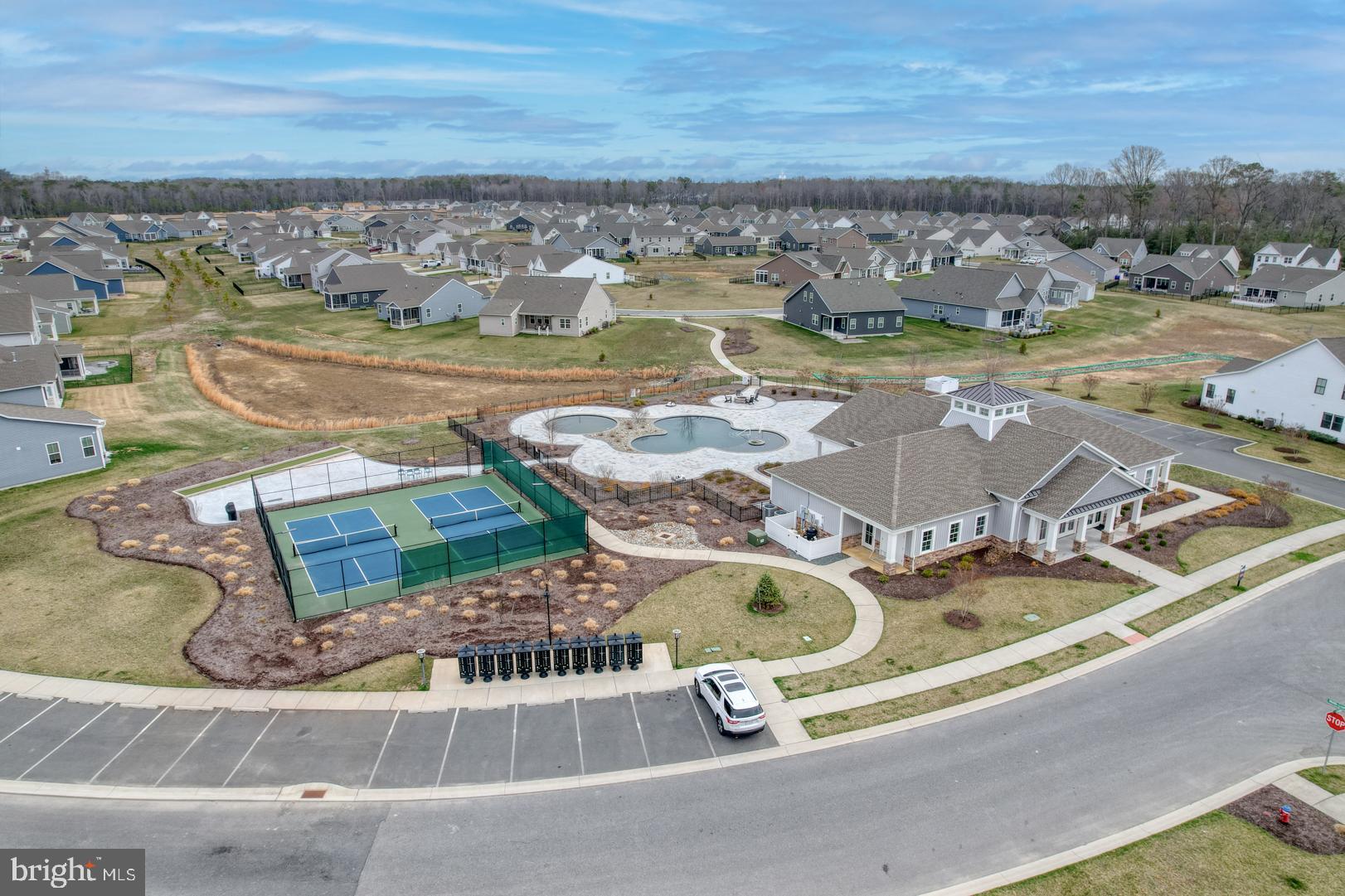 24077 Caldwell Circle Lewes, DE 19958 - Photo 57 of 60 an aerial view of residential houses with outdoor space