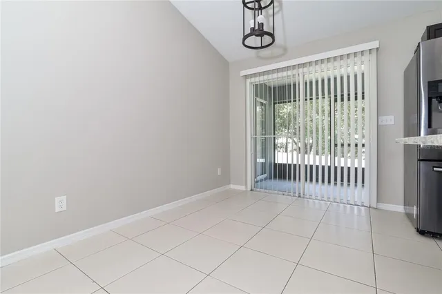 a view of a room with windows