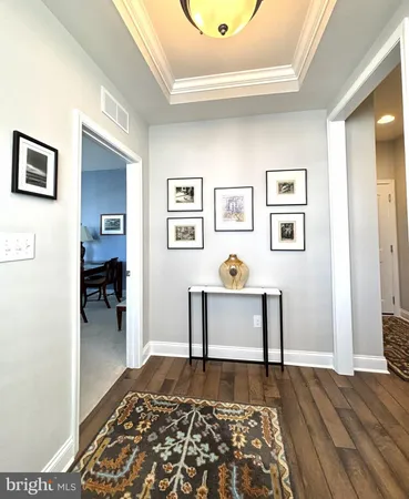 a bedroom with a bed and a rug