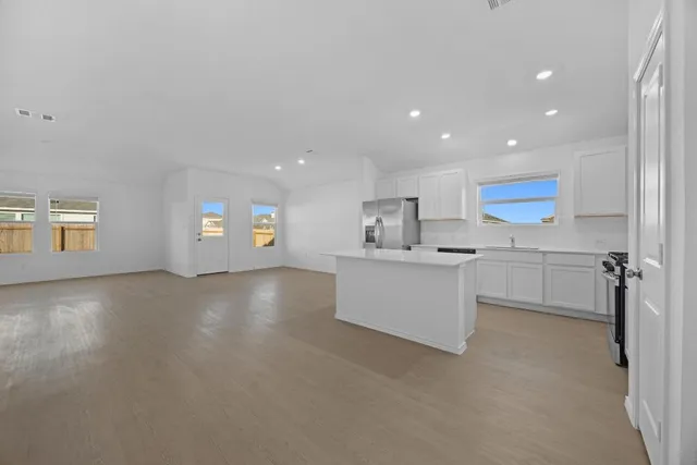 a view of a swimming pool with a table and chairs