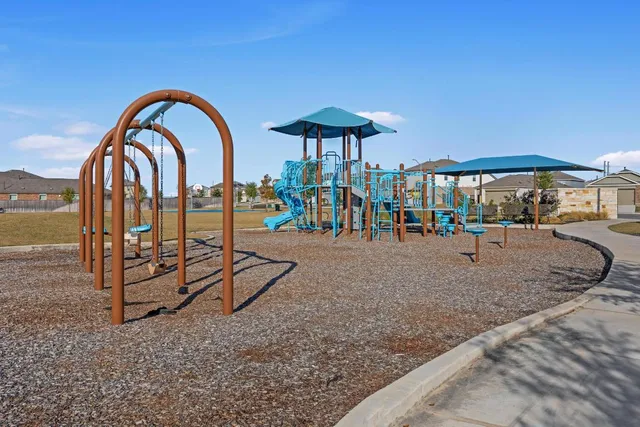 a view of yard and swimming pool