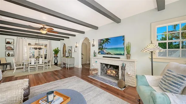 a kitchen with stainless steel appliances a sink a stove and a window