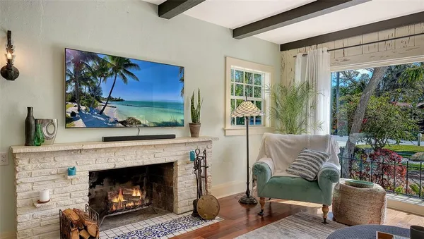a living room with furniture and a table