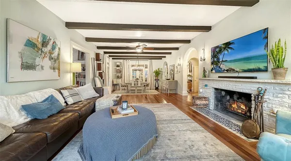 a view of a livingroom with furniture and wooden floor