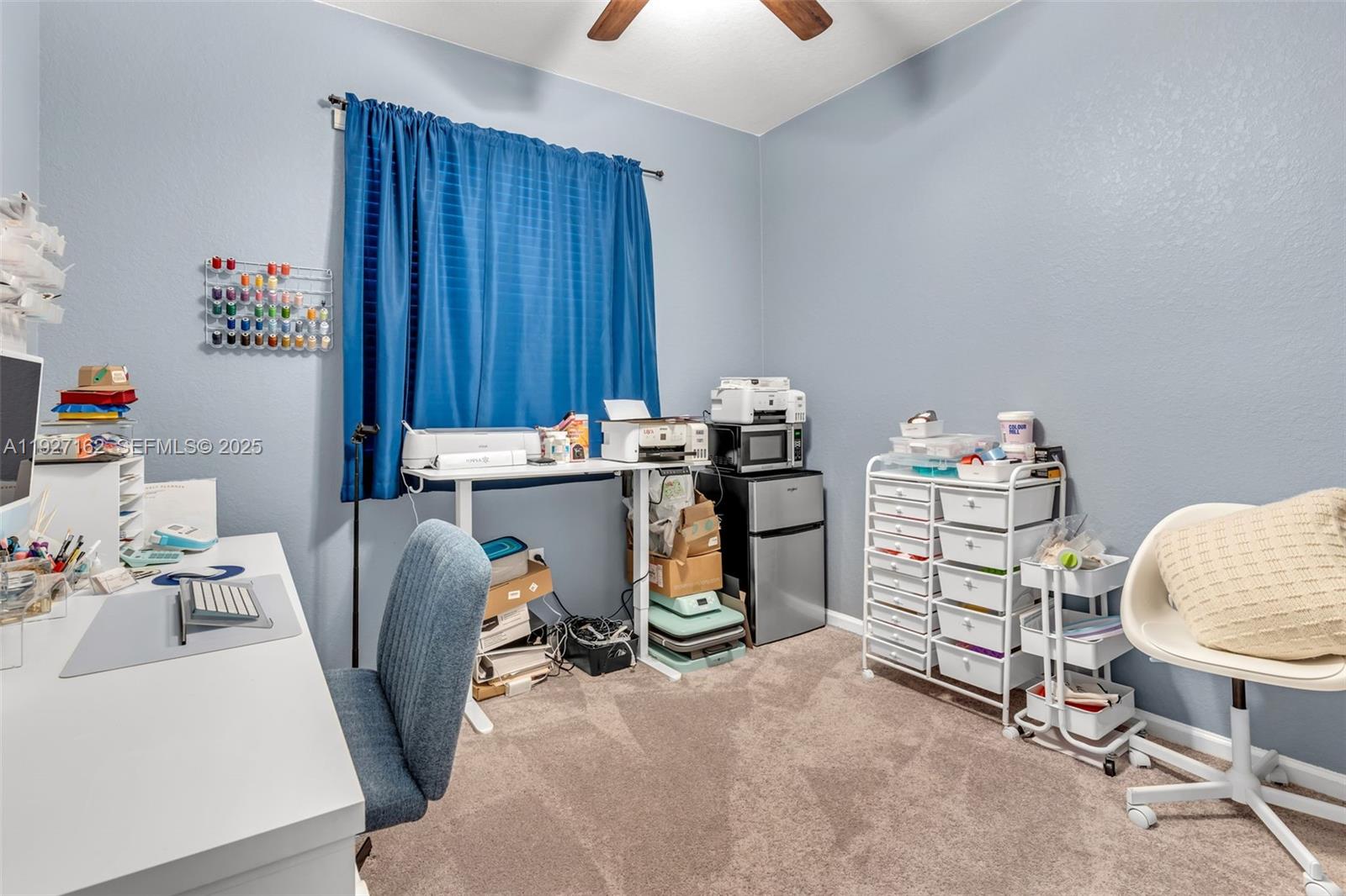 11833 Southwest 250th Terrace Homestead, FL 33032 - Photo 22 of 38 a workspace with furniture and a window