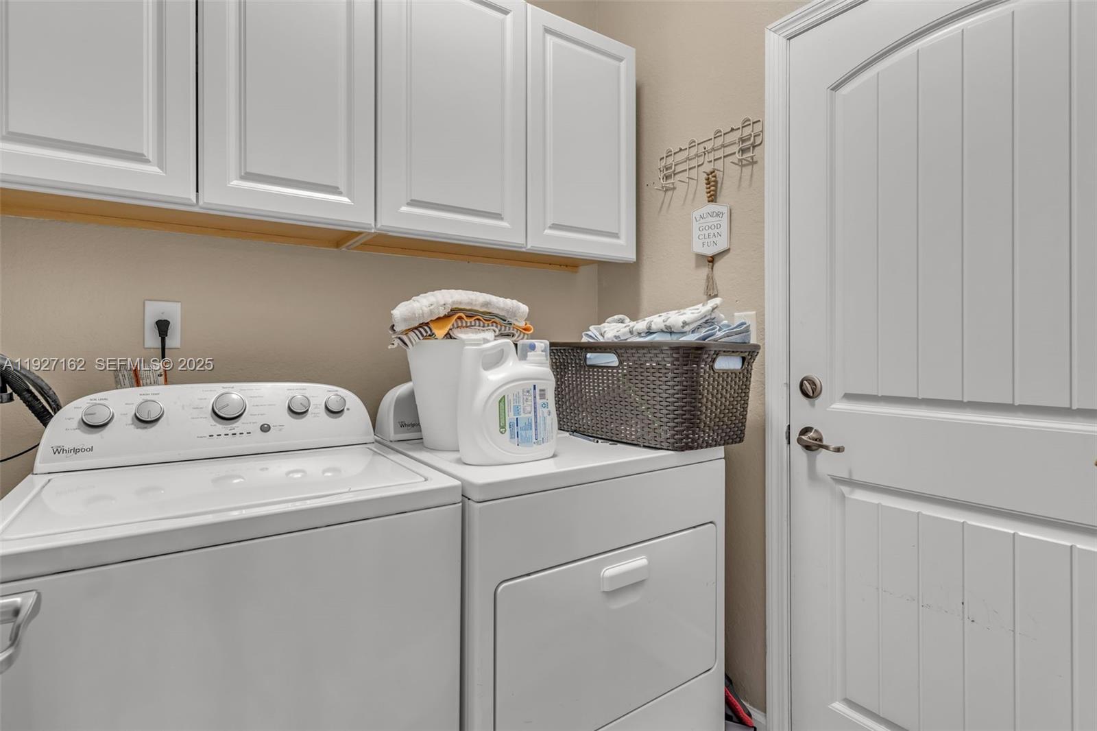 11833 Southwest 250th Terrace Homestead, FL 33032 - Photo 24 of 38 a utility room with dryer and washer