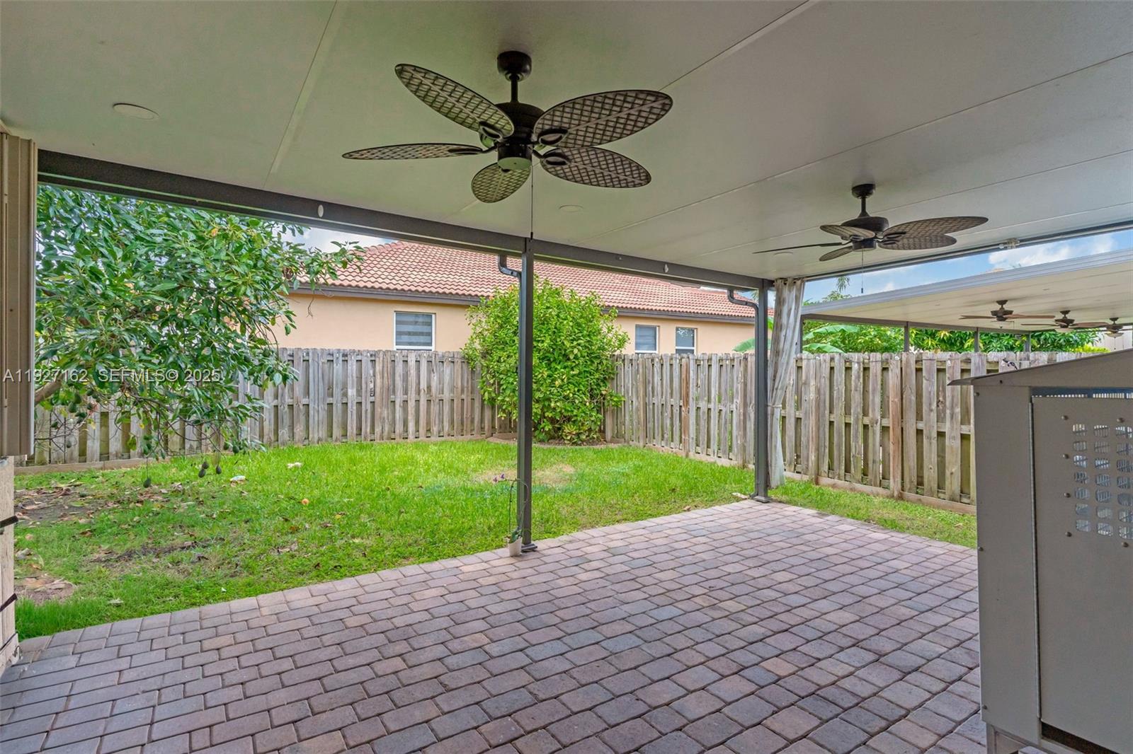 11833 Southwest 250th Terrace Homestead, FL 33032 - Photo 26 of 38 a view of a porch with a backyard