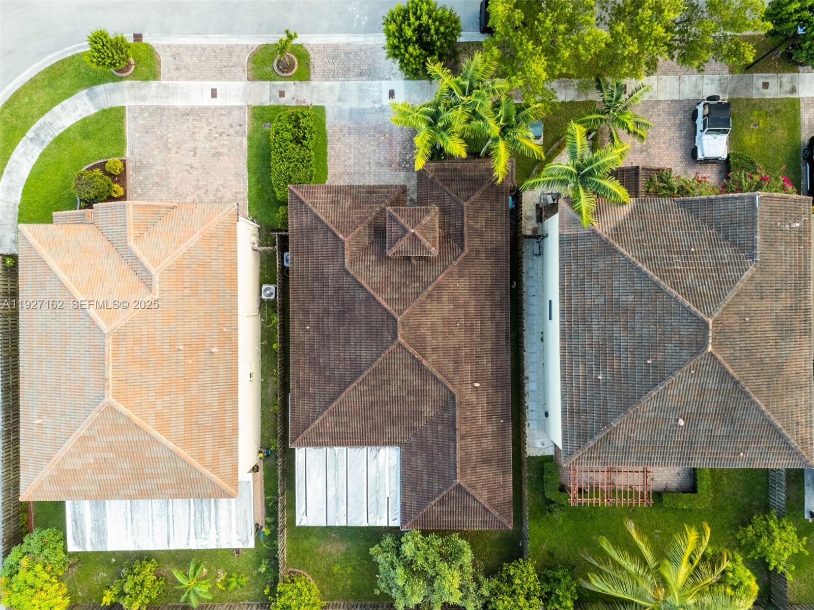 11833 Southwest 250th Terrace Homestead, FL 33032 - Photo 34 of 38 an aerial view of a house with a yard