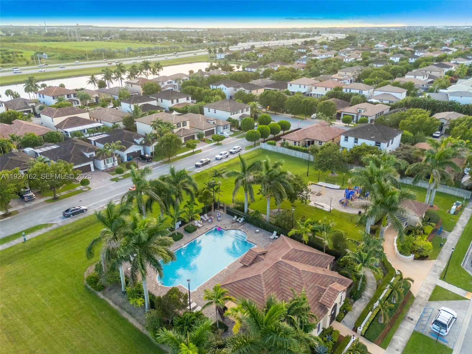11833 Southwest 250th Terrace Homestead, FL 33032 - Photo 37 of 38 an aerial view of residential houses with outdoor space