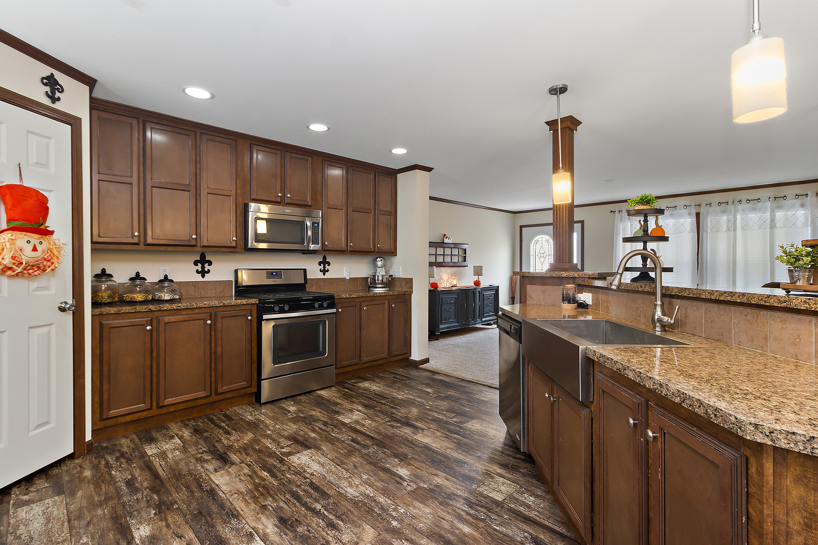 17 St Paul Bourbonnais, IL 60914 - Photo 4 of 16 a kitchen with stainless steel appliances granite countertop a sink stove and refrigerator
