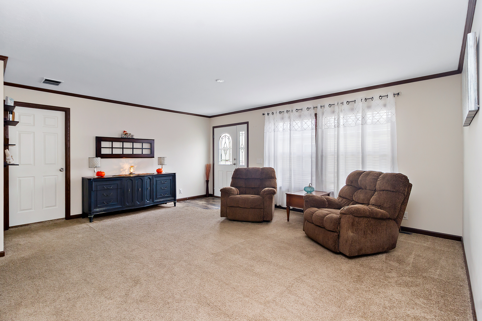 17 St Paul Bourbonnais, IL 60914 - Photo 5 of 16 a living room with furniture and a large window