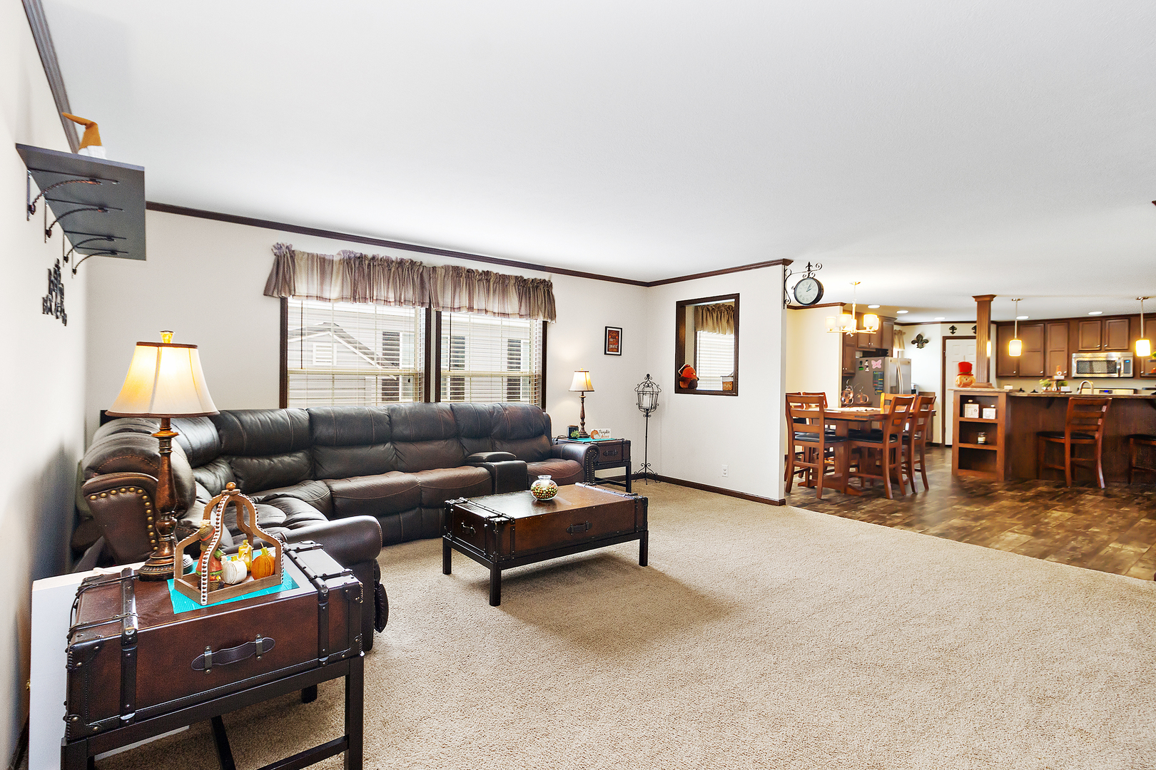 17 St Paul Bourbonnais, IL 60914 - Photo 8 of 16 a living room with furniture and a dining table with kitchen view