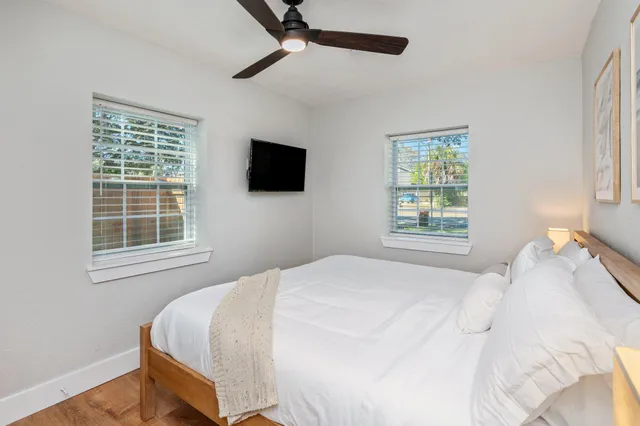 a bedroom with a bed and a view of bathroom