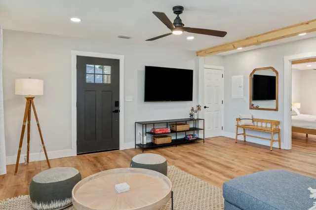 a kitchen with stainless steel appliances granite countertop a stove microwave and cabinets