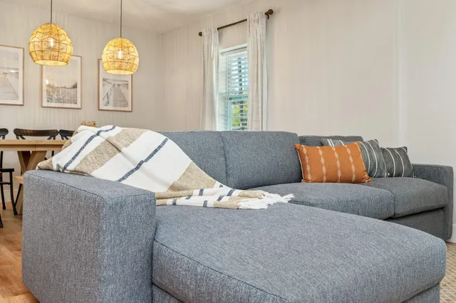 a view of a dining table and chairs in a room
