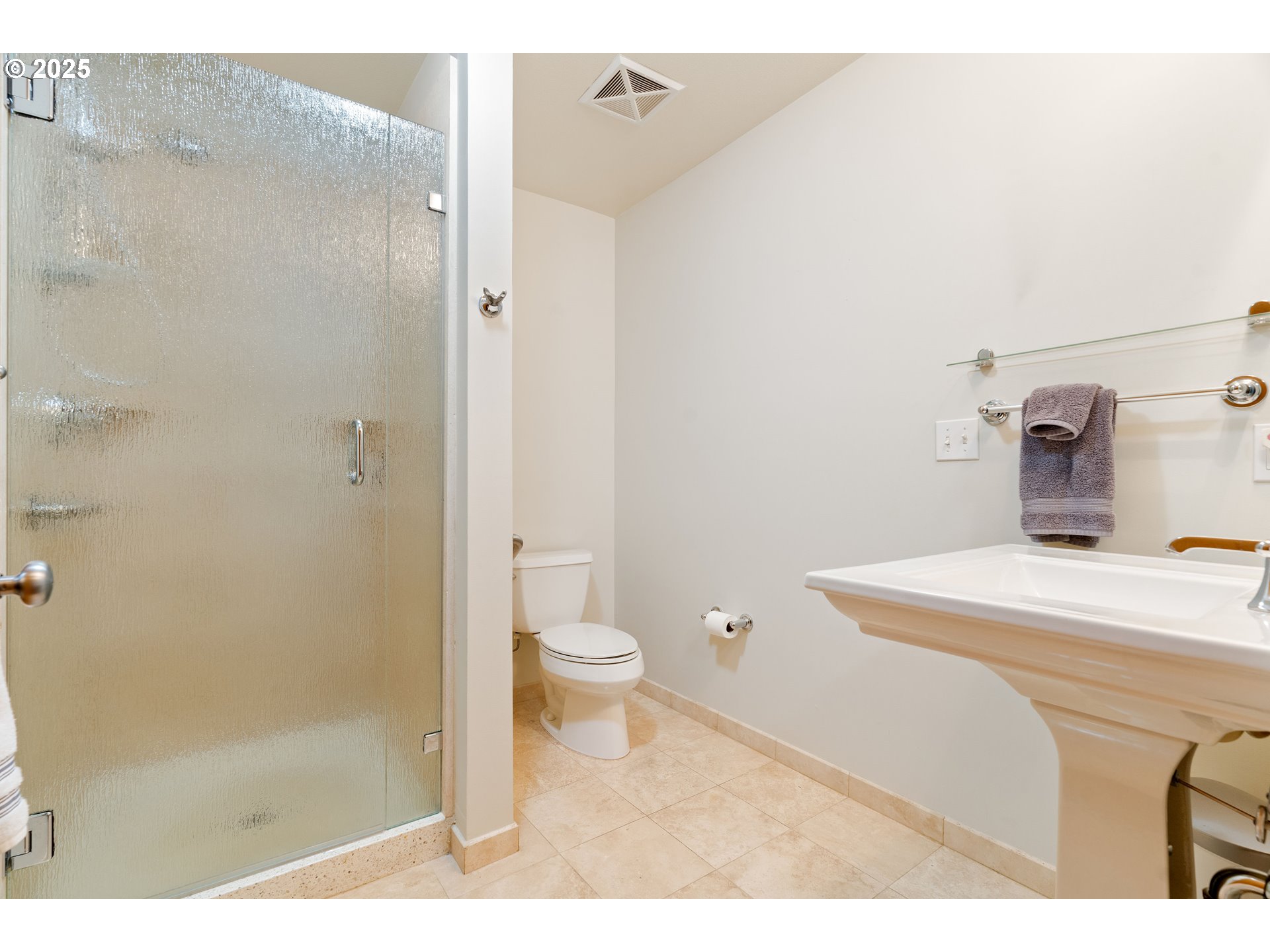 2350 Northwest Savier Street, Unit 202 Portland, OR 97210 - Photo 23 of 30 a bathroom with a sink a toilet and shower