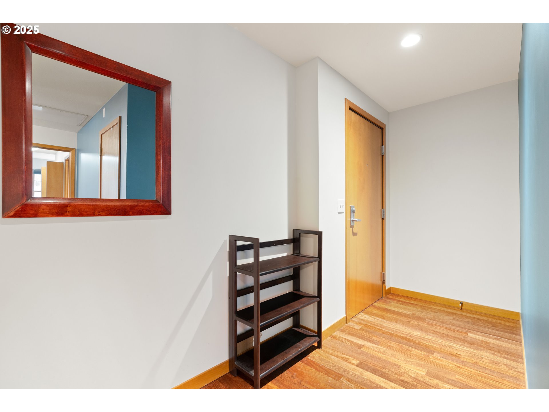 2350 Northwest Savier Street, Unit 202 Portland, OR 97210 - Photo 24 of 30 a view of a living room with a wooden floor
