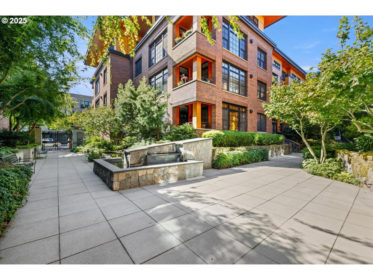 2350 Northwest Savier Street, Unit 202 Portland, OR 97210 - Photo 27 of 30 a front view of a building