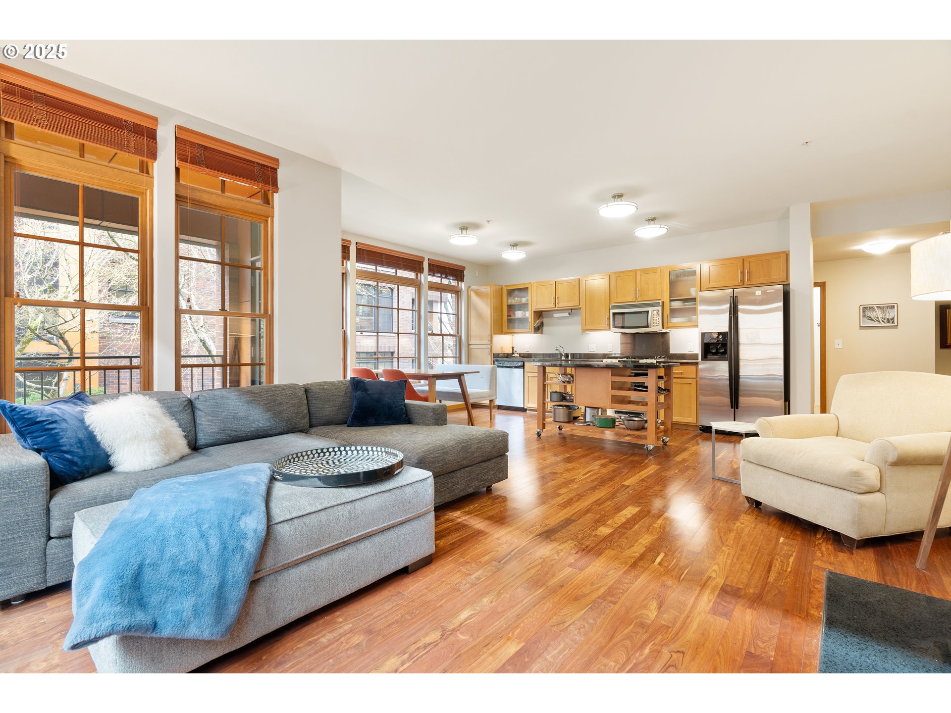 2350 Northwest Savier Street, Unit 202 Portland, OR 97210 - Photo 6 of 30 a living room with furniture and a large window