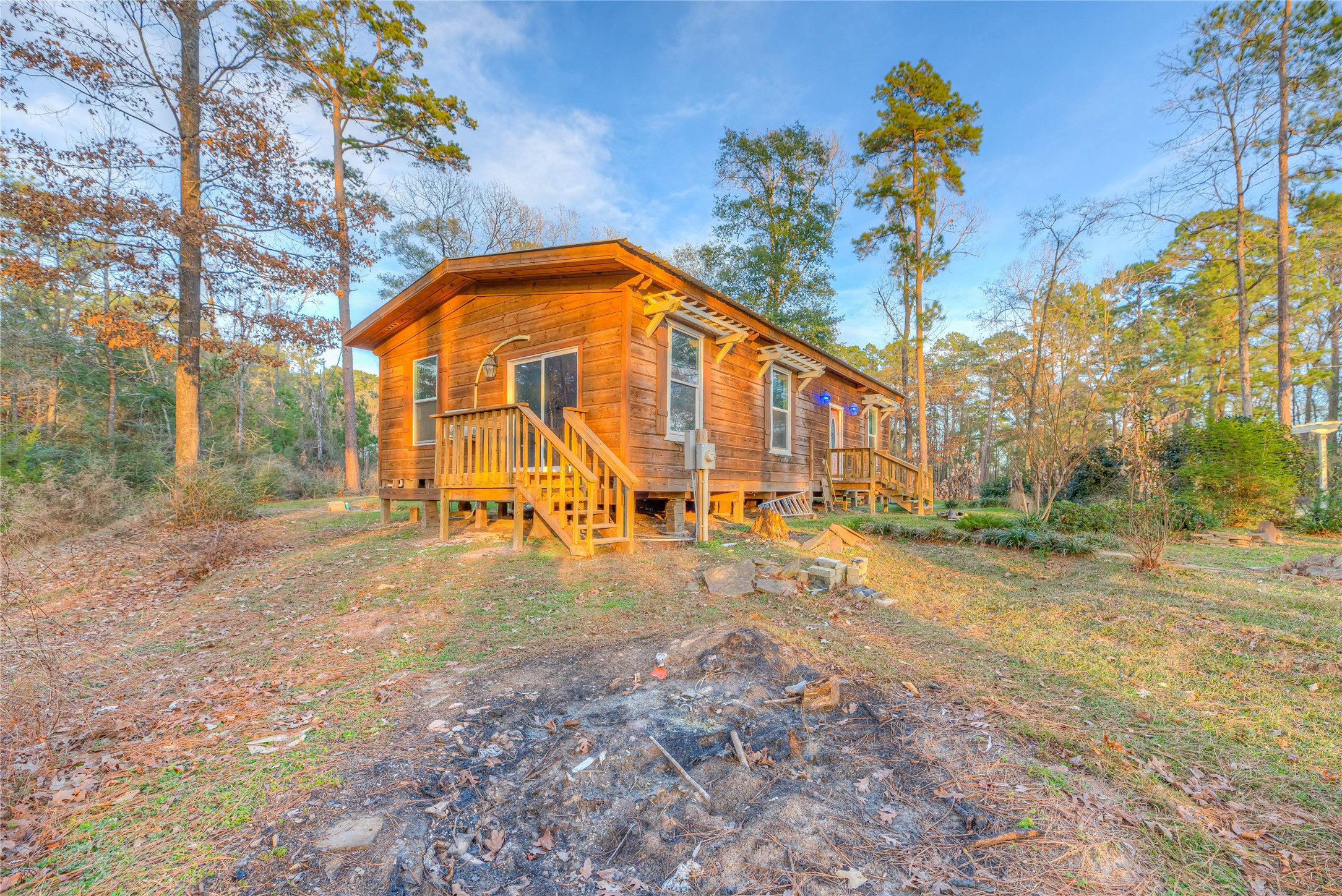 228 1 Such Road Livingston, TX 77351 - Photo 17 of 35 a view of a large house with a yard