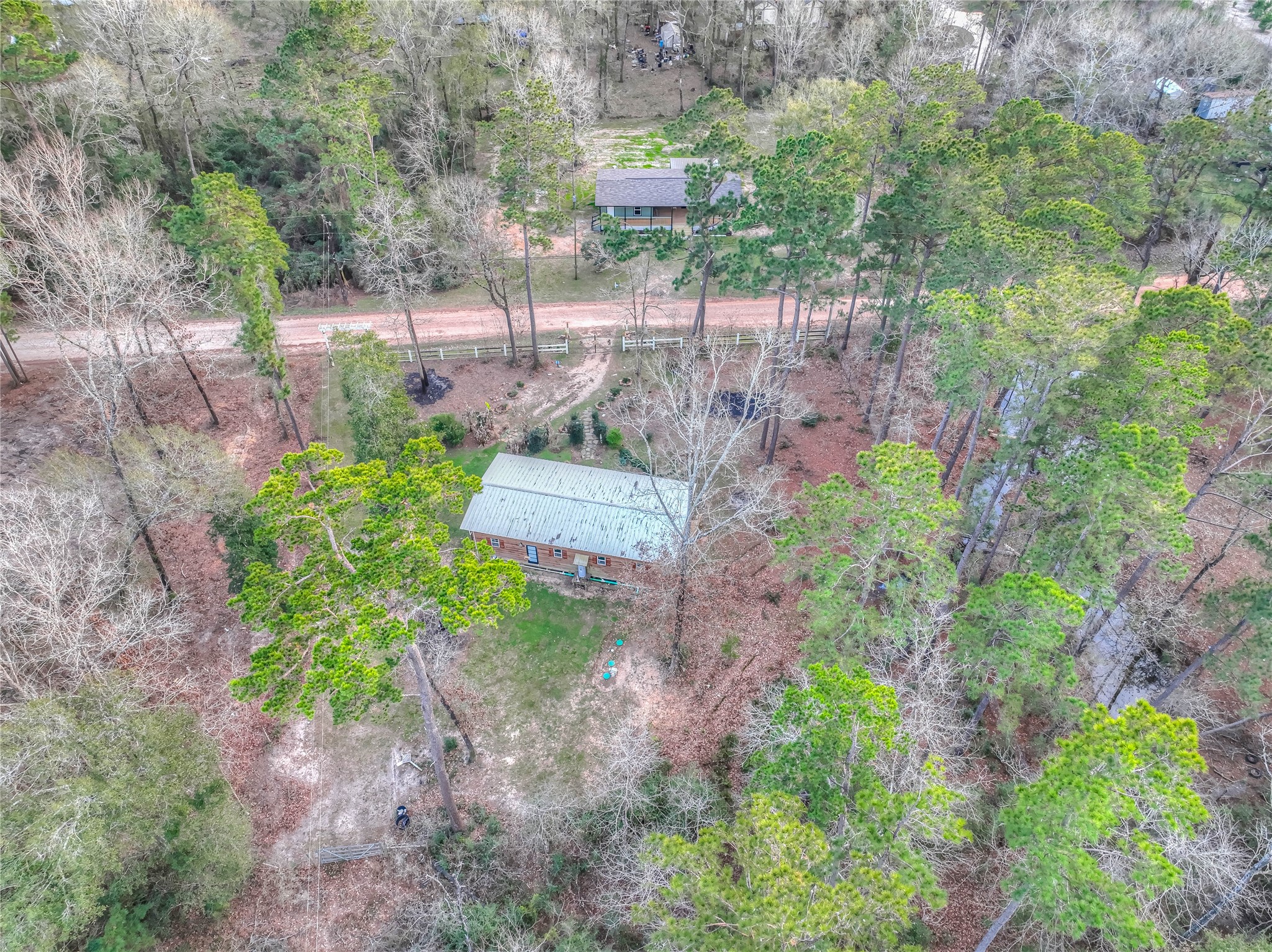 228 1 Such Road Livingston, TX 77351 - Photo 29 of 35 a view of a garden with large trees
