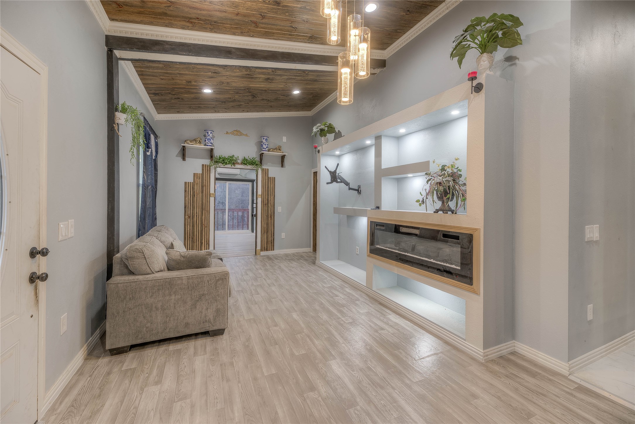 228 1 Such Road Livingston, TX 77351 - Photo 10 of 35 a living room with furniture and a fireplace
