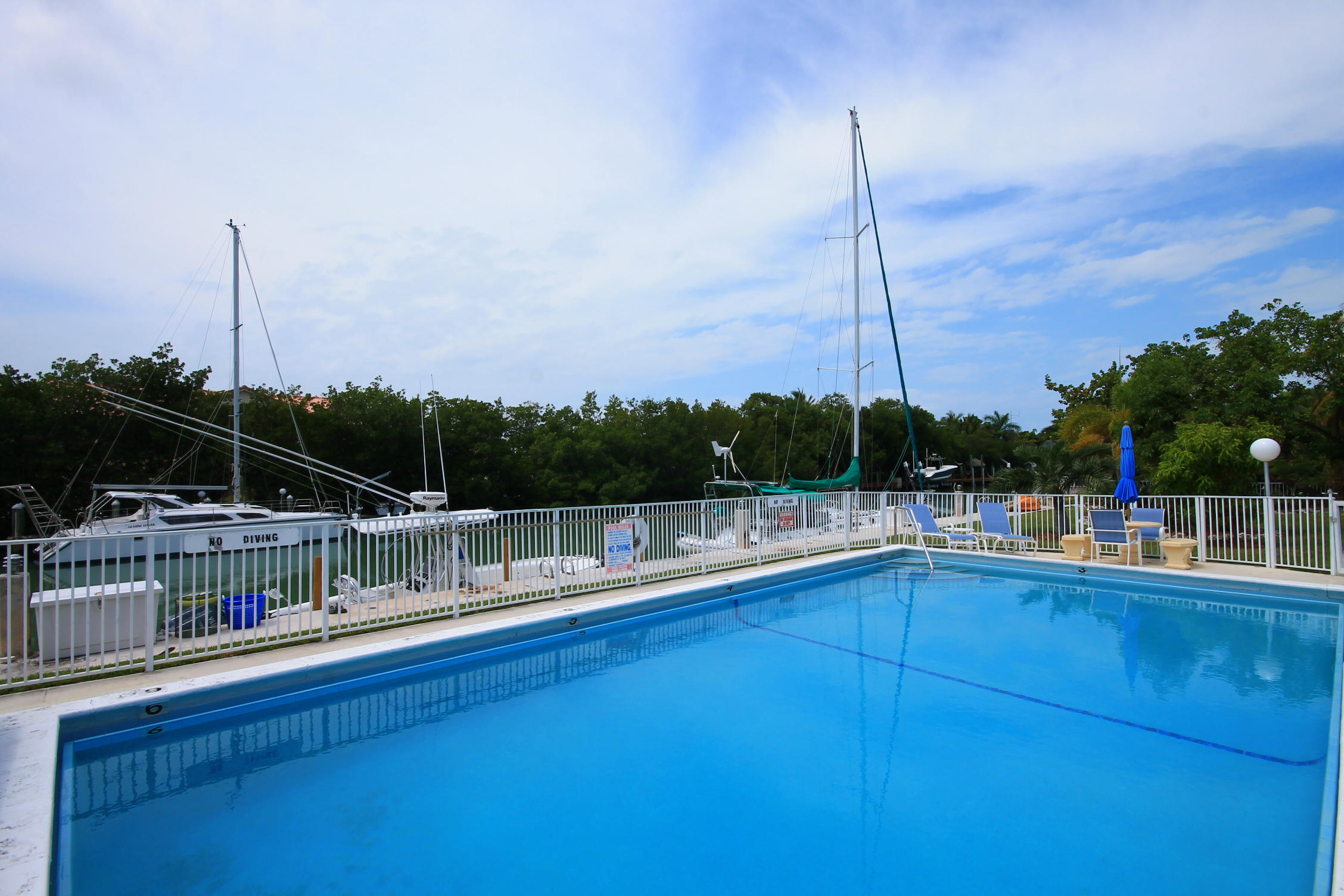 593 Sombrero Beach Road, Unit 12 Marathon, FL 33050 - Photo 16 of 22 16-Pool with Canal 2