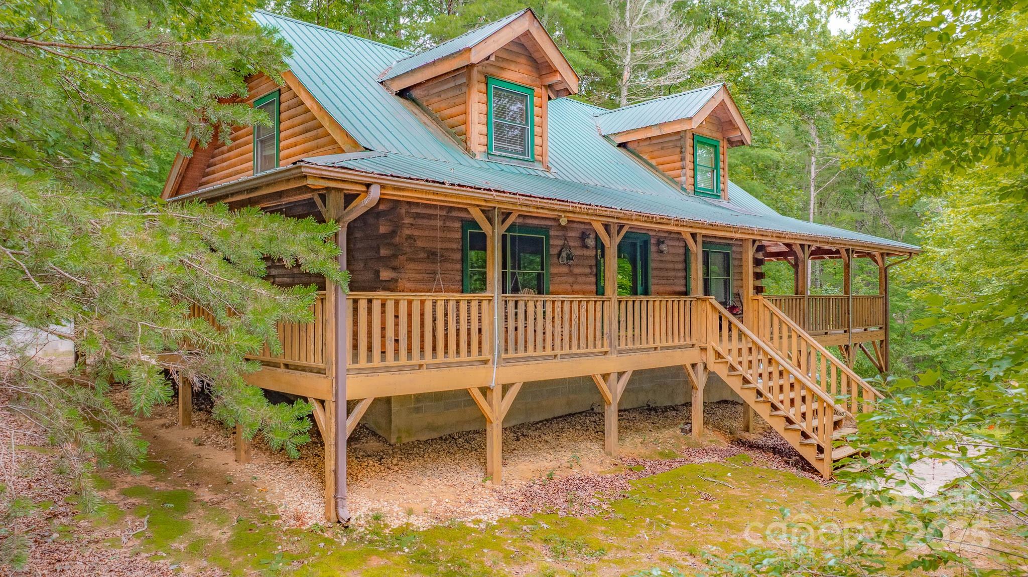 a balcony with table and chairs