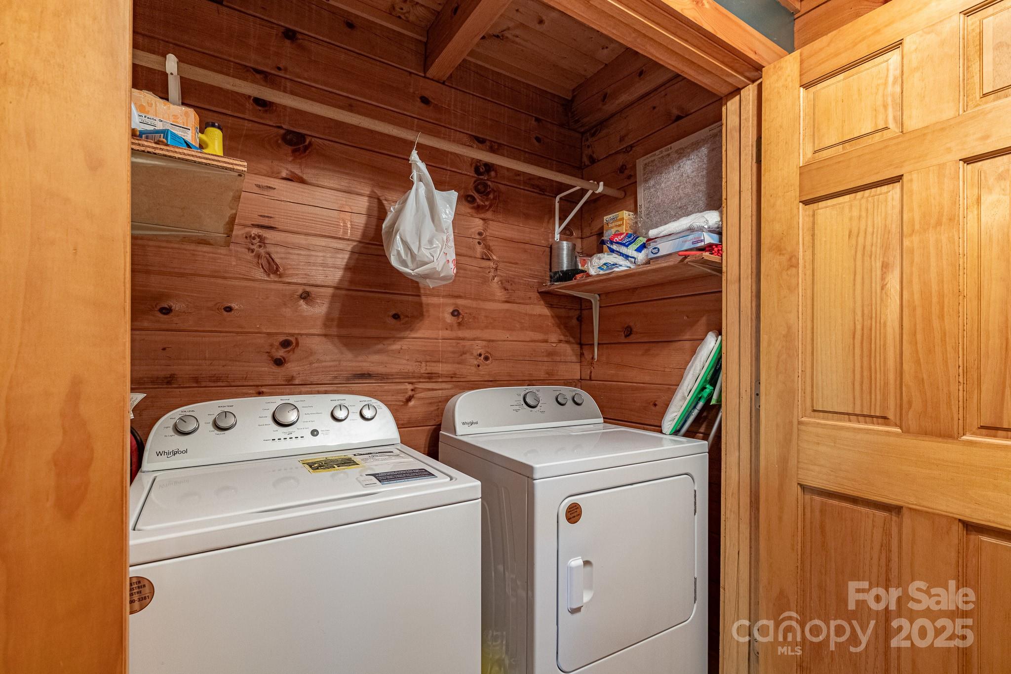 8331 Sugar Hill Road Marion, NC 28752 - Photo 11 of 36 a utility room with dryer and washer