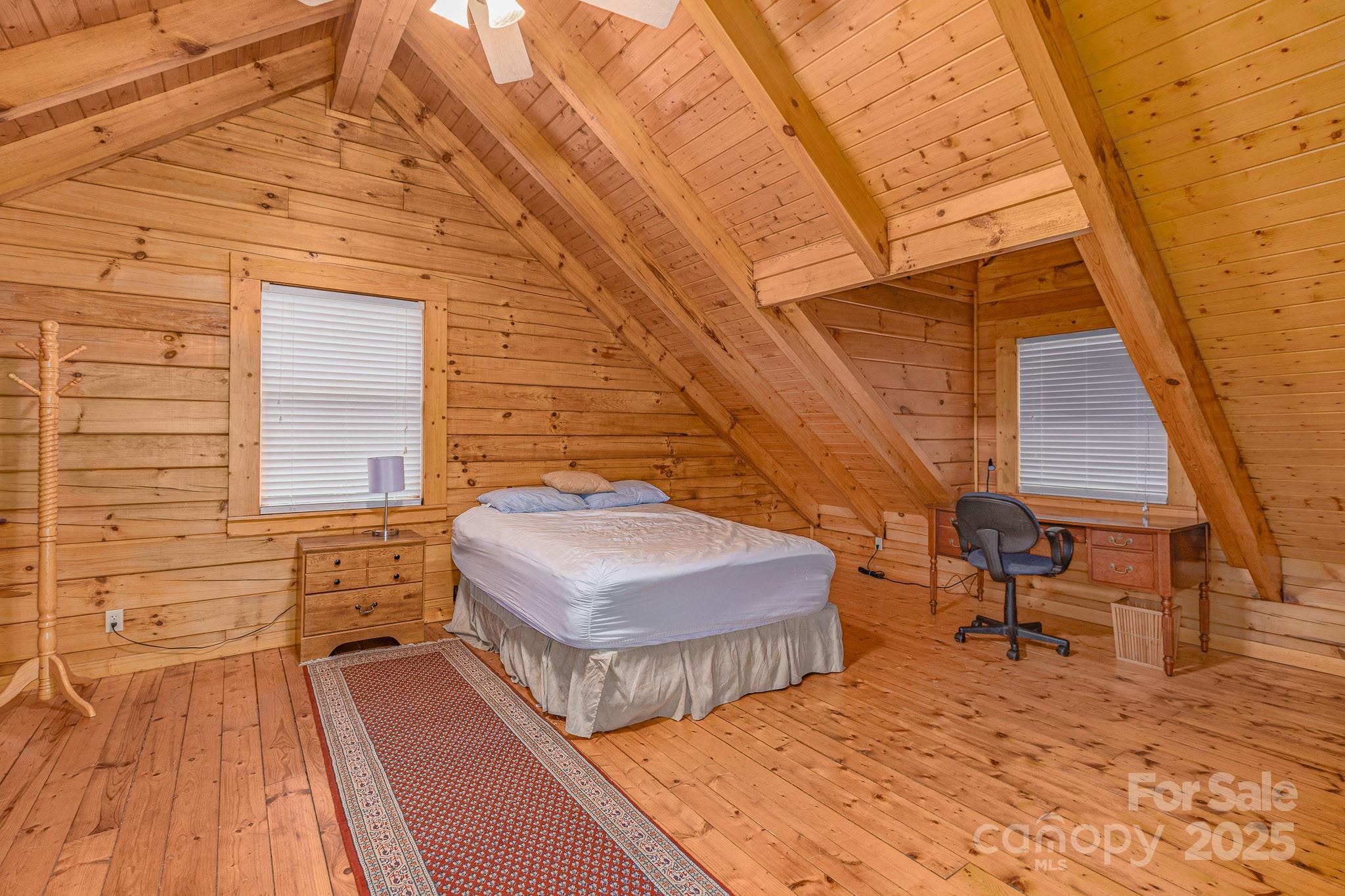 8331 Sugar Hill Road Marion, NC 28752 - Photo 14 of 36 a view of balcony with two chairs and a table