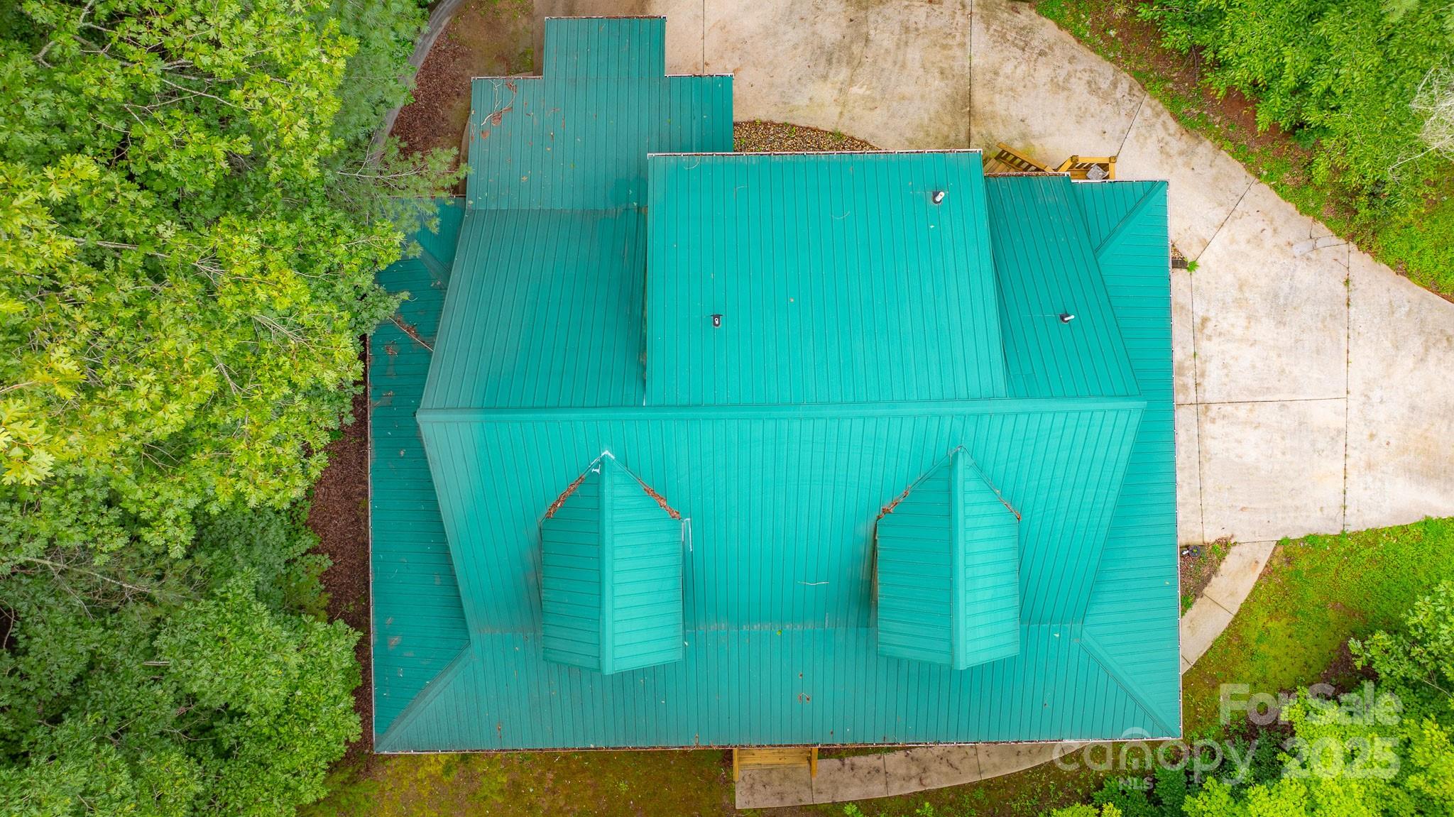 8331 Sugar Hill Road Marion, NC 28752 - Photo 28 of 36 a green field with trees in the background