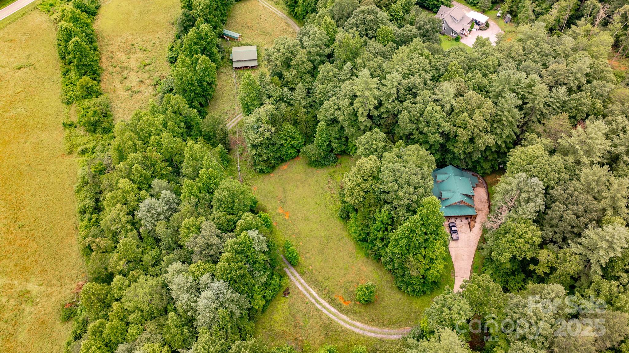 8331 Sugar Hill Road Marion, NC 28752 - Photo 29 of 36 a view of a garden