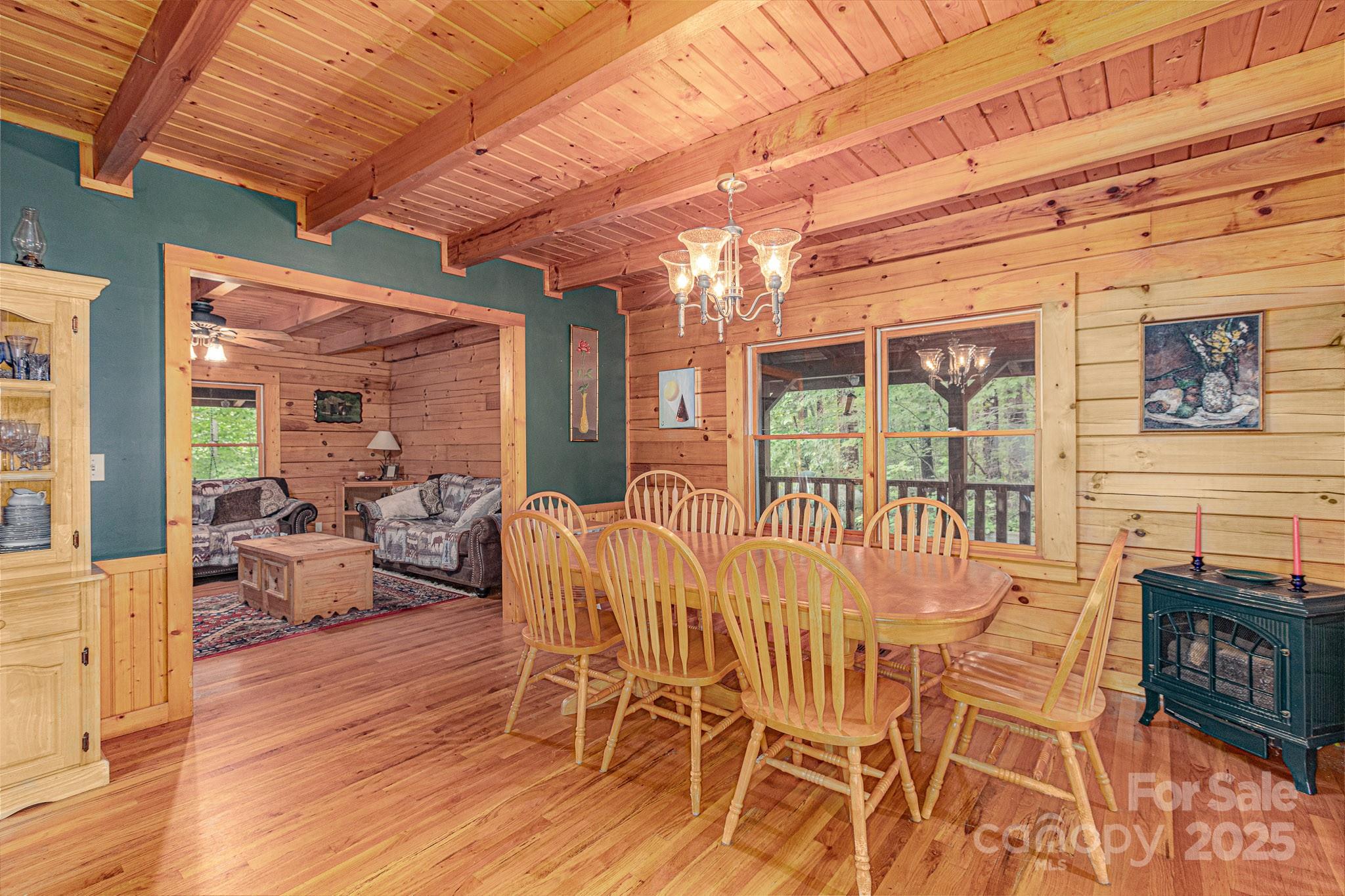 8331 Sugar Hill Road Marion, NC 28752 - Photo 6 of 36 a outdoor space with lots of chairs and wooden floor