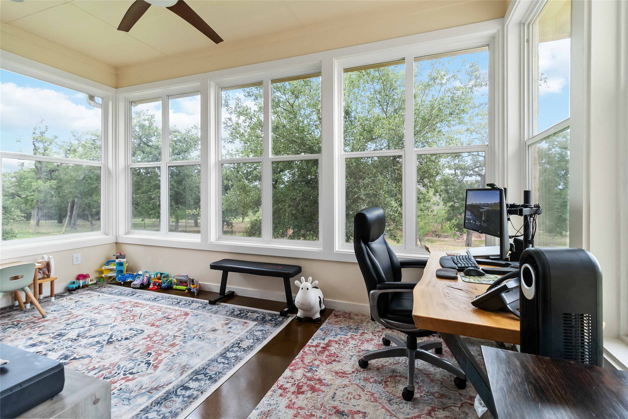 129 Powder Horn Road Bastrop, TX 78602 - Photo 12 of 27 Office featuring a ceiling fan and dark wood-type flooring