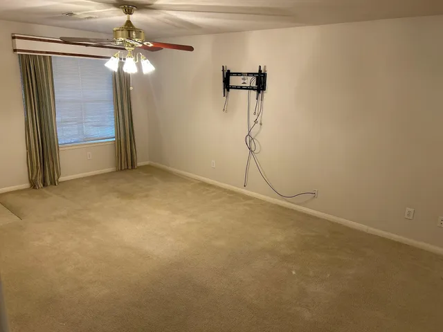 a bathroom with a toilet and a sink