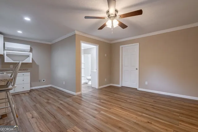 a close view of a sink a faucet and appliance in the kitchen