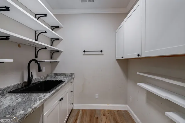 an aerial view of residential house with outdoor space