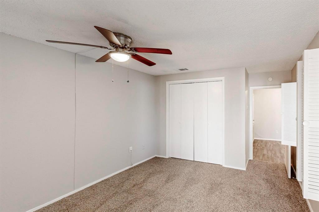 9696 Walnut Street, Unit 1402 Dallas, TX 75243 - Photo 27 of 33 a view of an empty room