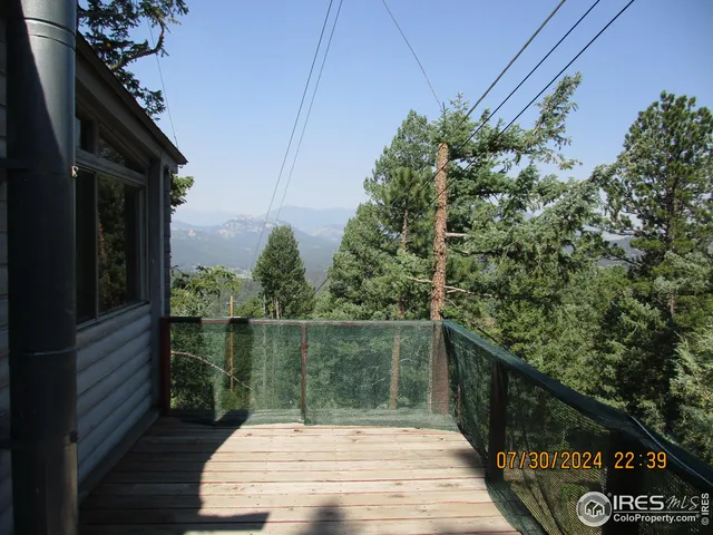 a terrace view with two chairs