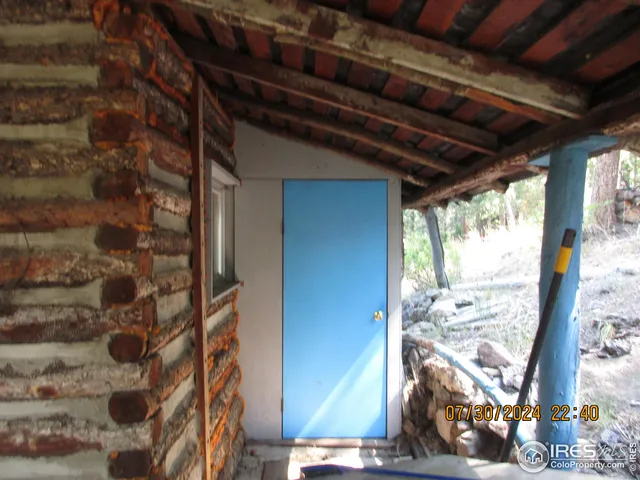 a view of a porch with a door