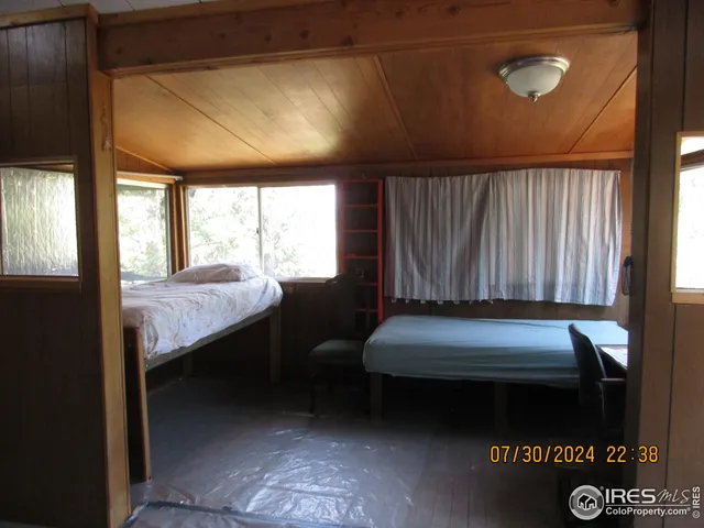 a room with furniture and window