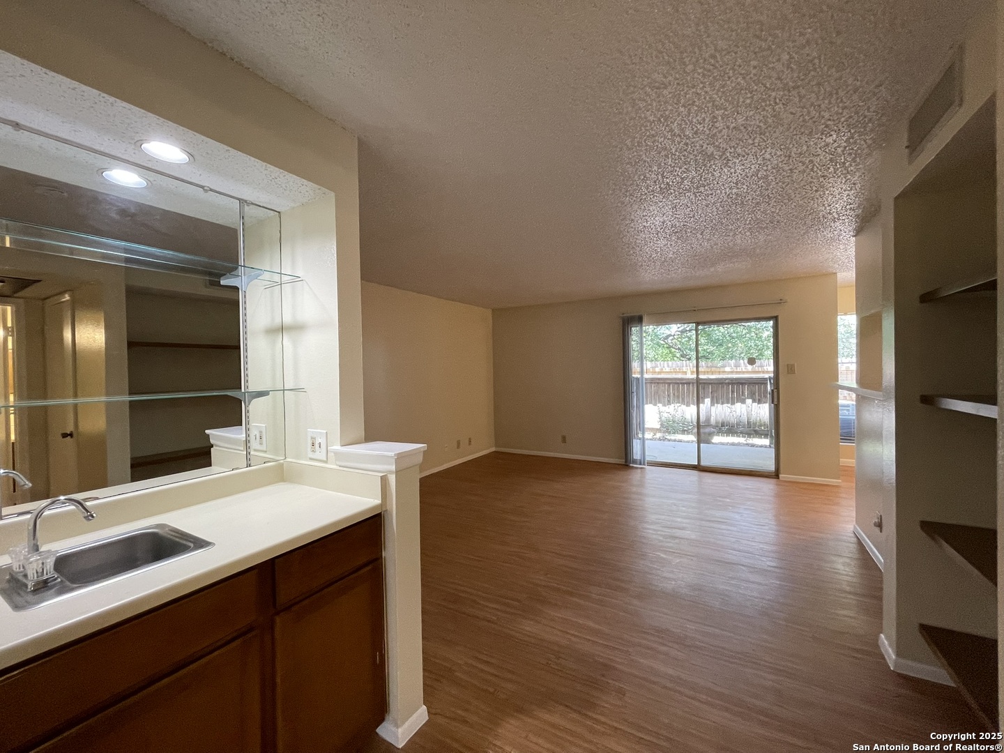 11311 Sir Winston Street, Unit 604 San Antonio, TX 78216 - Photo 15 of 24 a bathroom with a sink double vanity and a mirror
