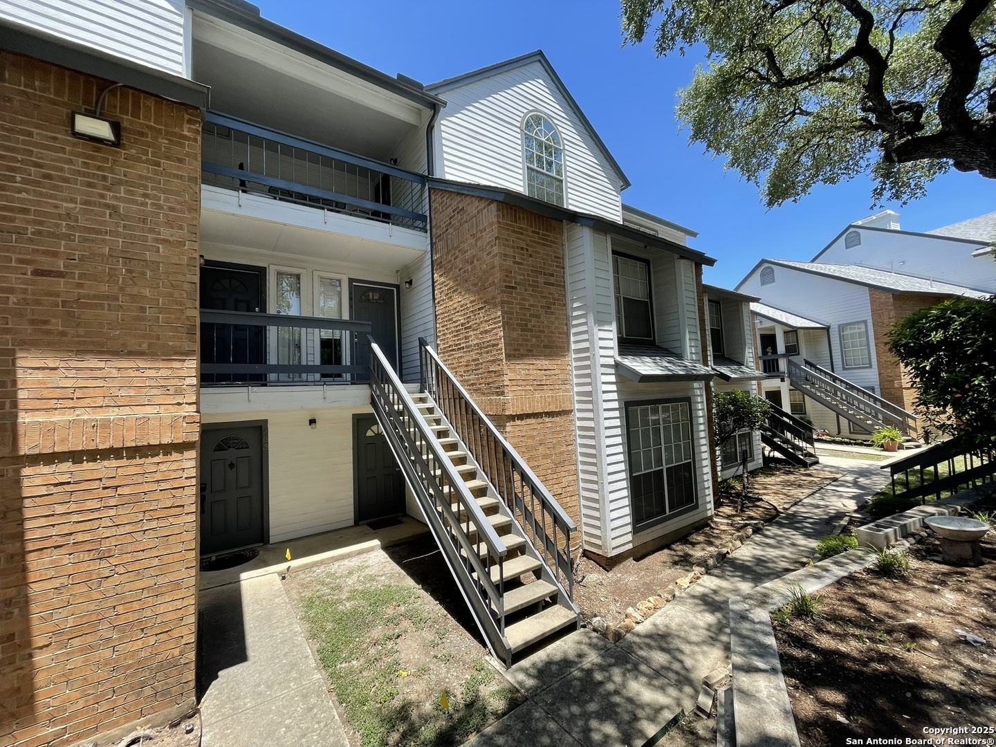 11311 Sir Winston Street, Unit 604 San Antonio, TX 78216 - Photo 2 of 24 a view of an entryway door and balcony