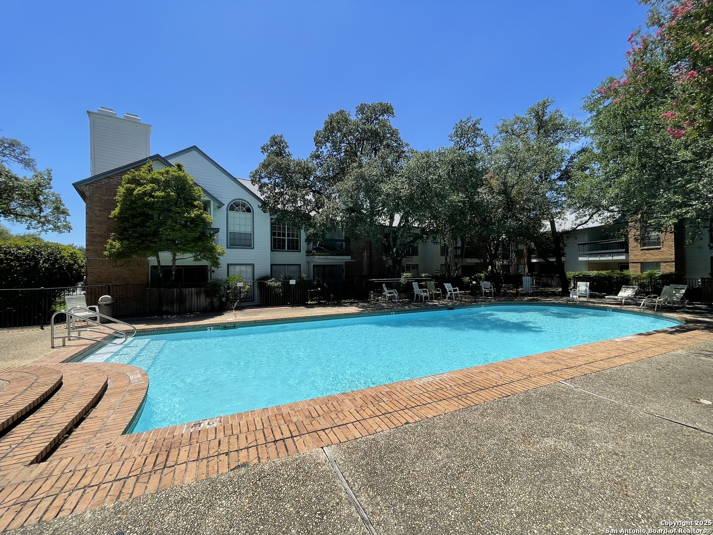 11311 Sir Winston Street, Unit 604 San Antonio, TX 78216 - Photo 23 of 24 a view of a backyard with a garden