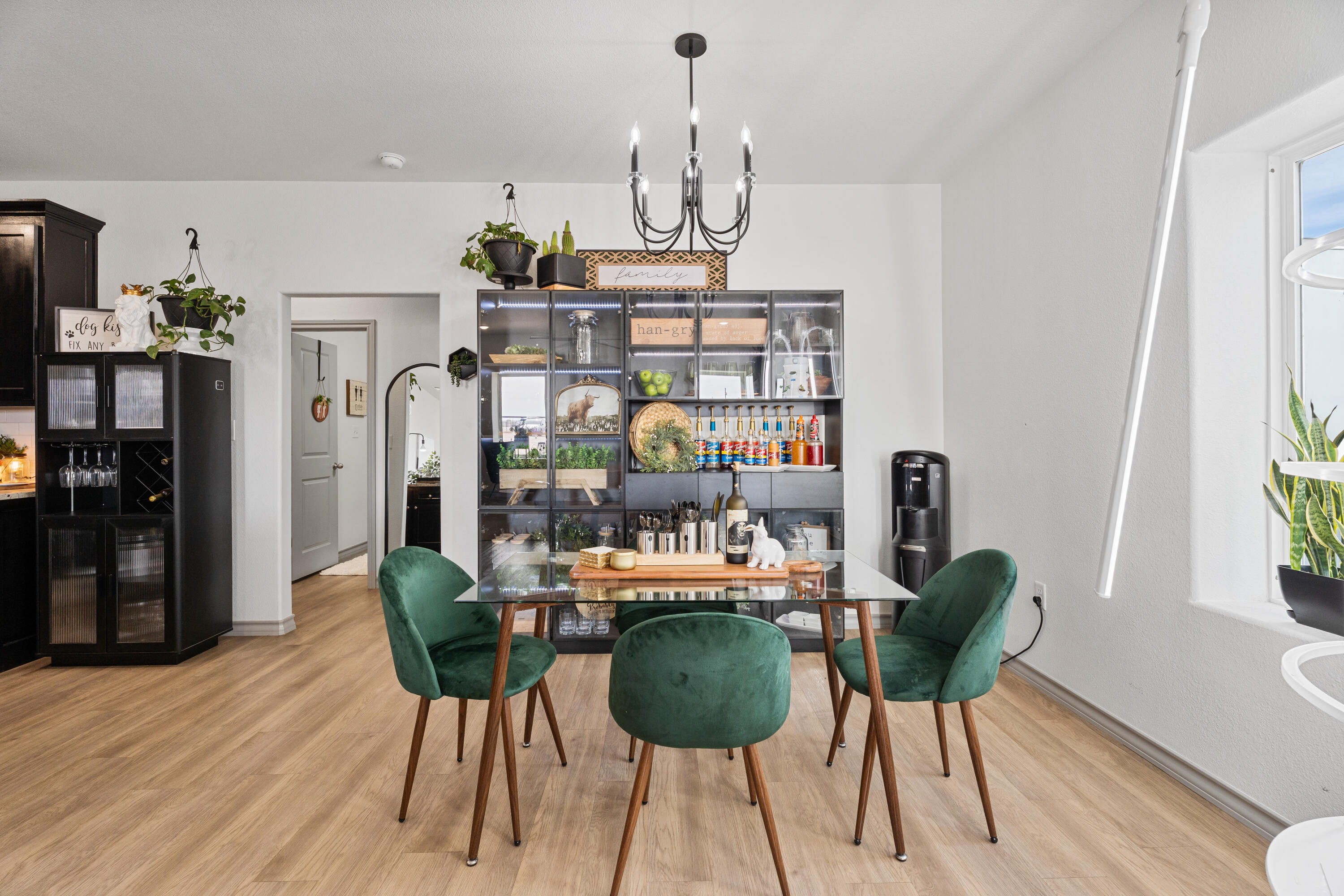 184 Allison Road Wilson, TX 79381 - Photo 9 of 41 a view of a dining room with furniture window and wooden floor
