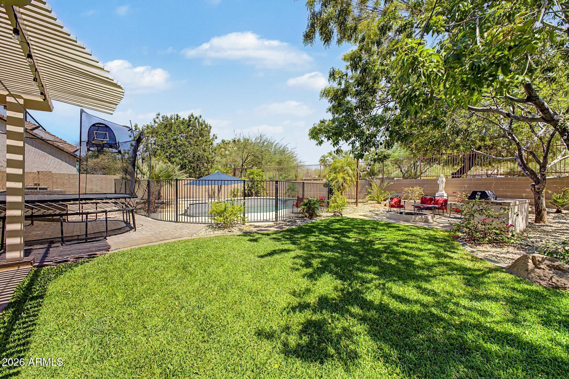 1829 East Beverly Road Phoenix, AZ 85042 - Photo 33 of 48 Lush Backyard w BBQ and Firepit