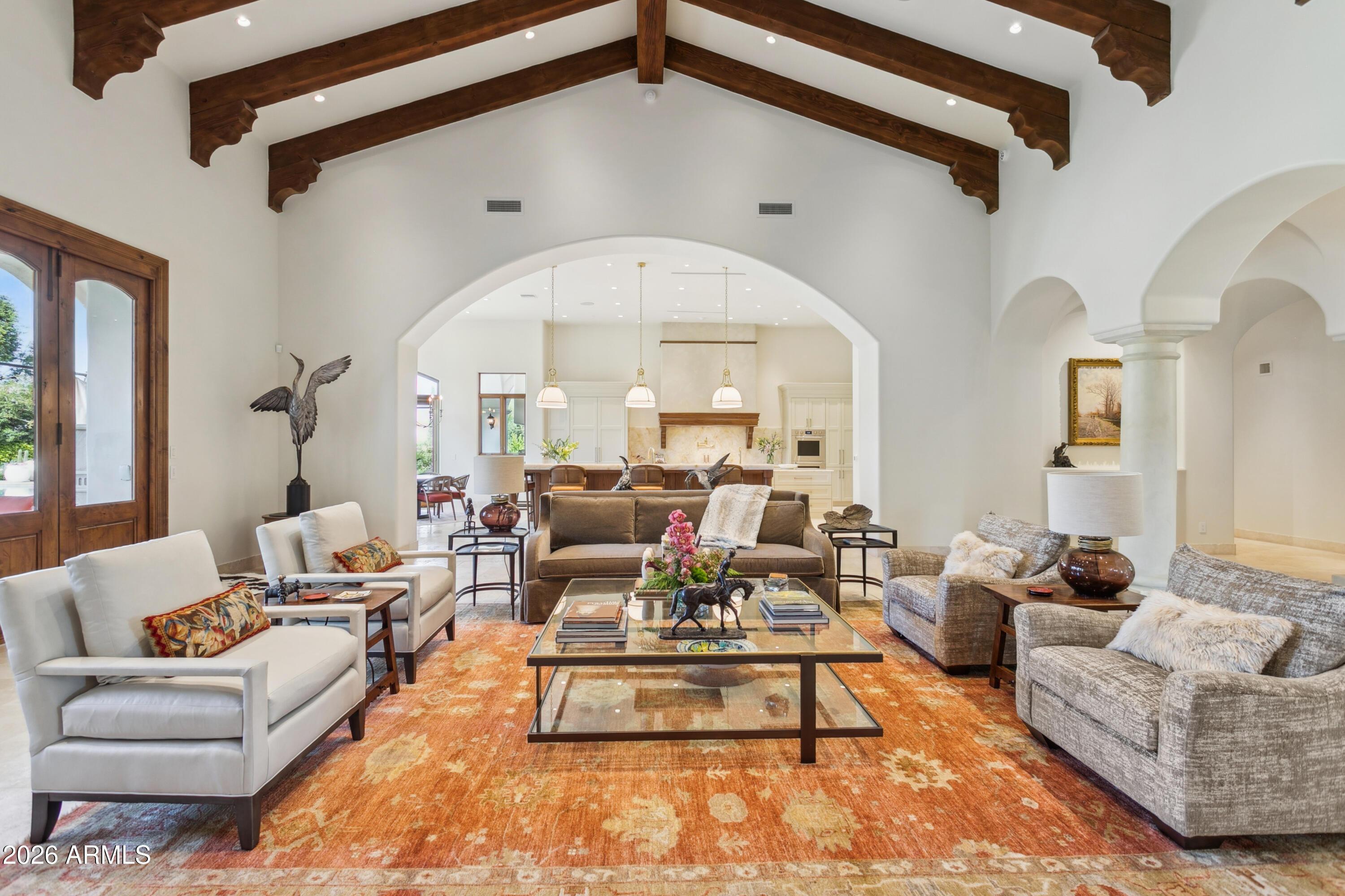 6674 East Judson Road Paradise Valley, AZ 85253 - Photo 2 of 92 a living room with furniture and a large window
