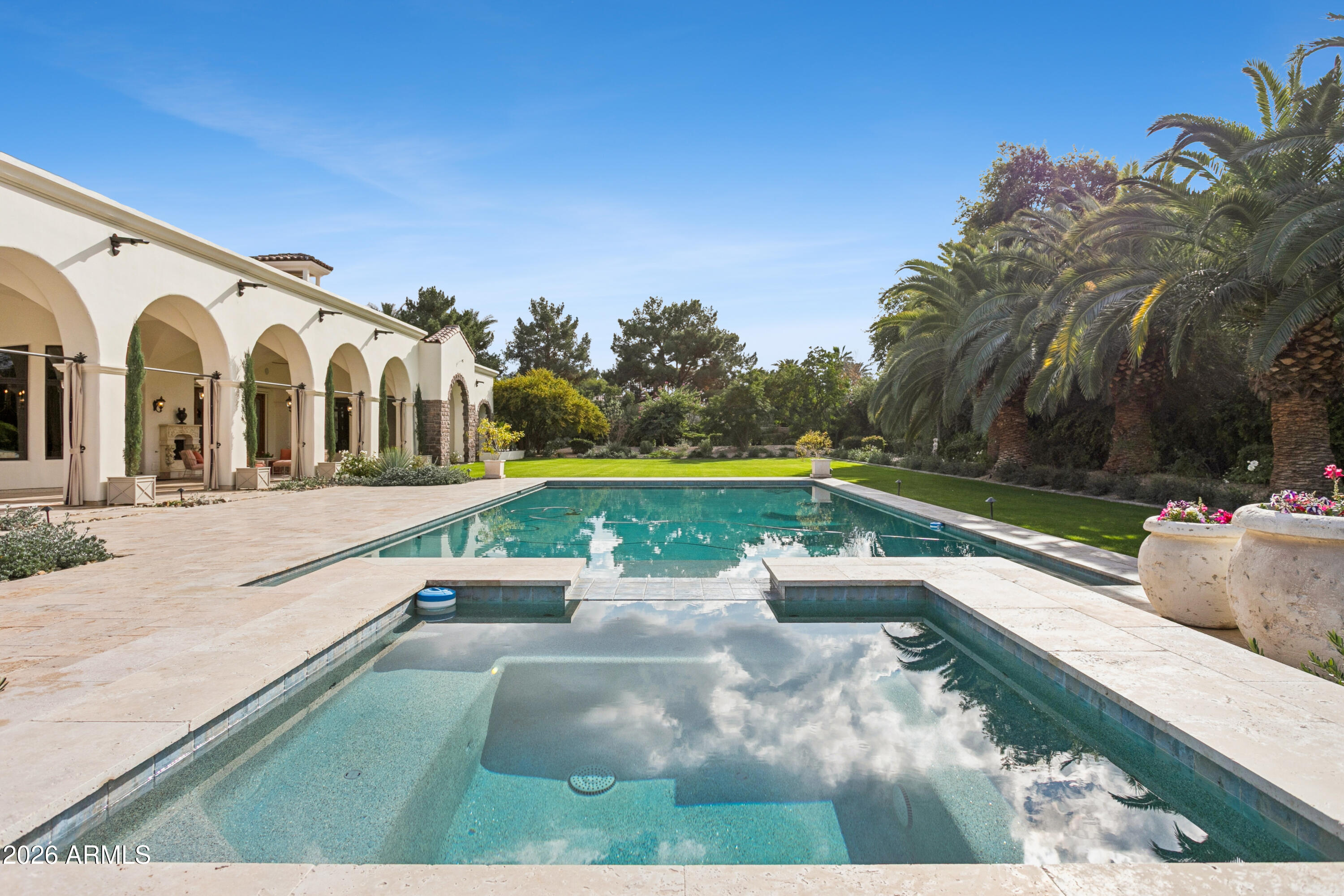6674 East Judson Road Paradise Valley, AZ 85253 - Photo 75 of 92 a view of swimming pool with outdoor seating and yard