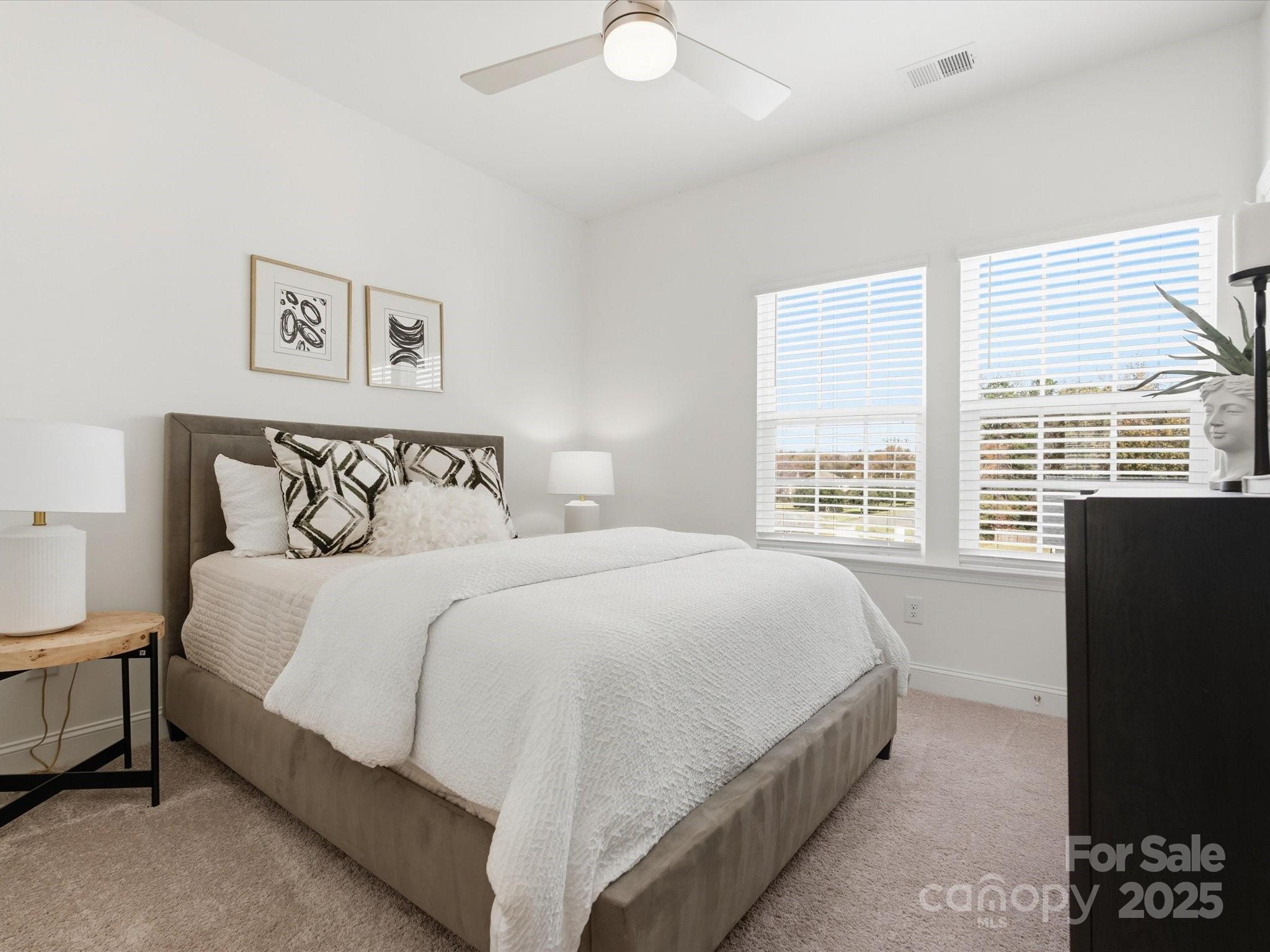 3132 Butler Hl Drive Matthews, NC 28105 - Photo 25 of 36 a bedroom with a bed and a window